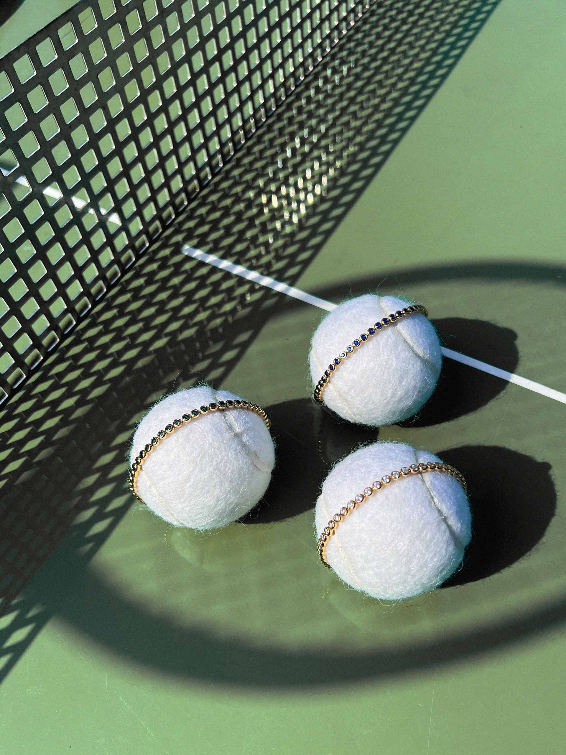 missoma-holding-tennis-body