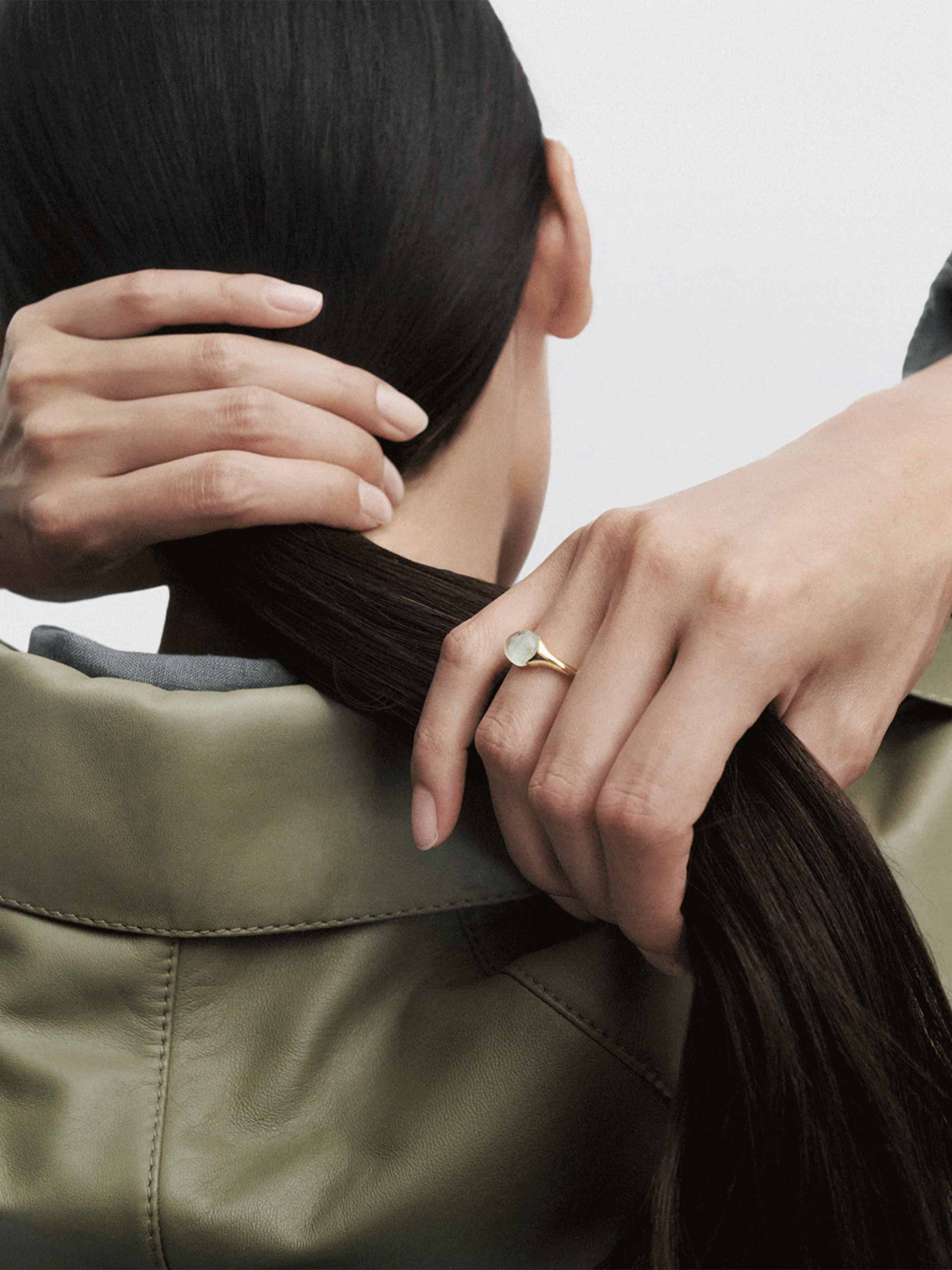 green-holding-pdpaola Image: PDPaola